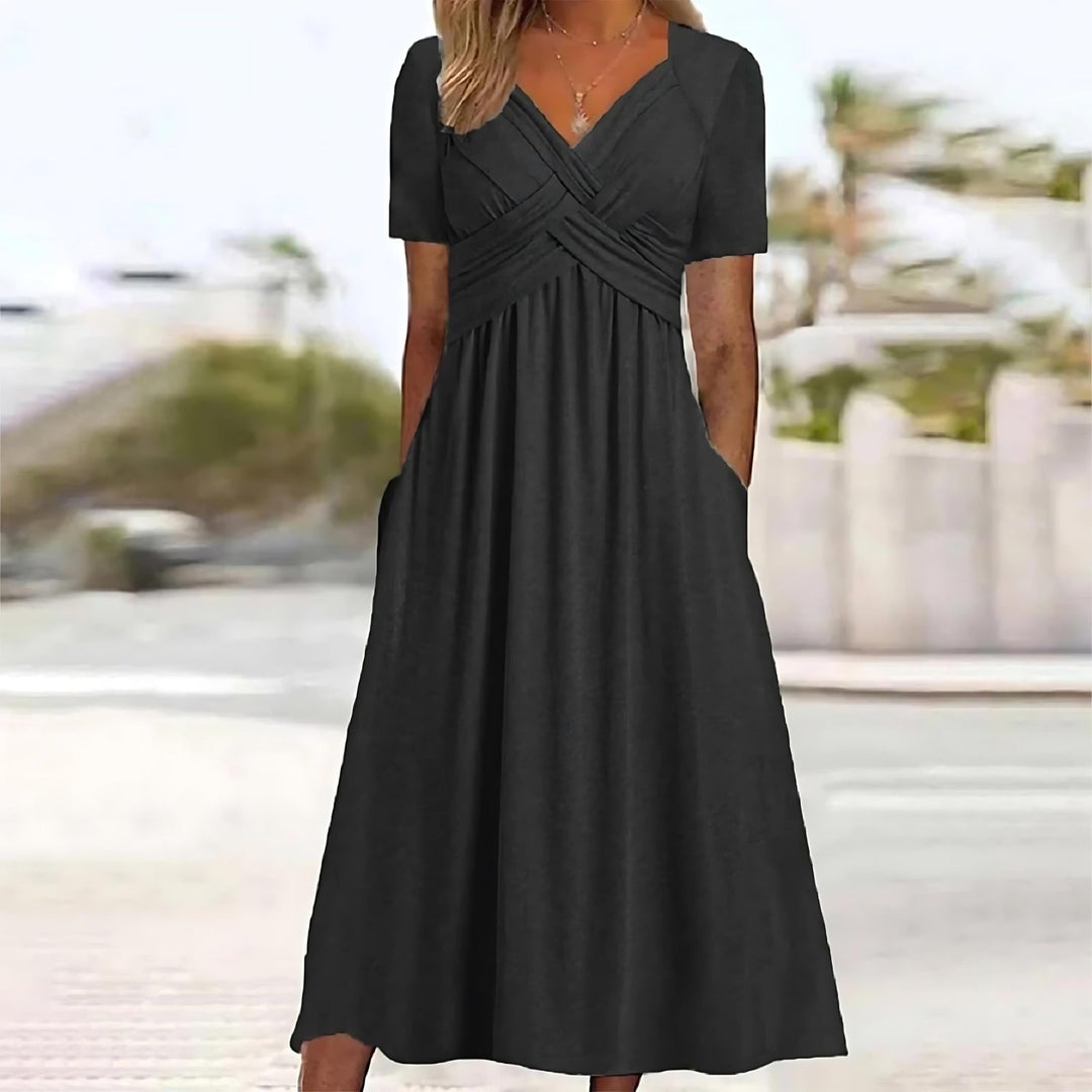 Inez | Mouwloze midi jurk